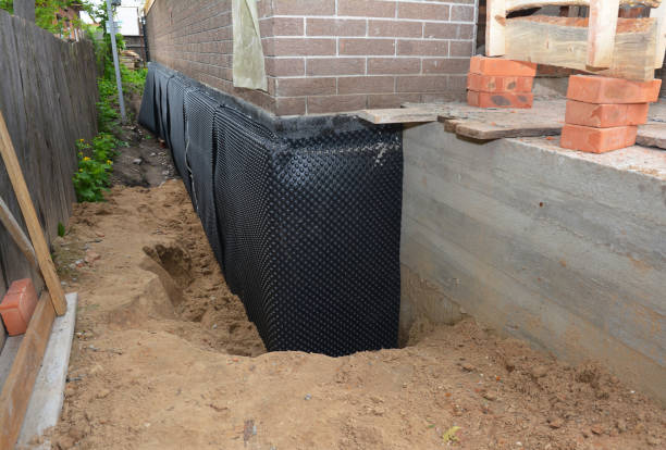 Happy homeowners after waterproofing job in New Milford